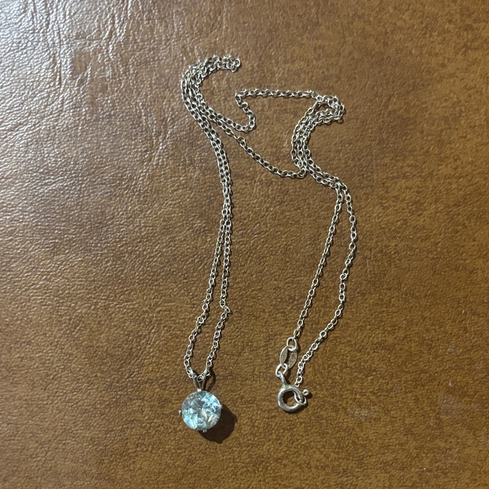 Silver Pendant Necklace with Light Blue Stone